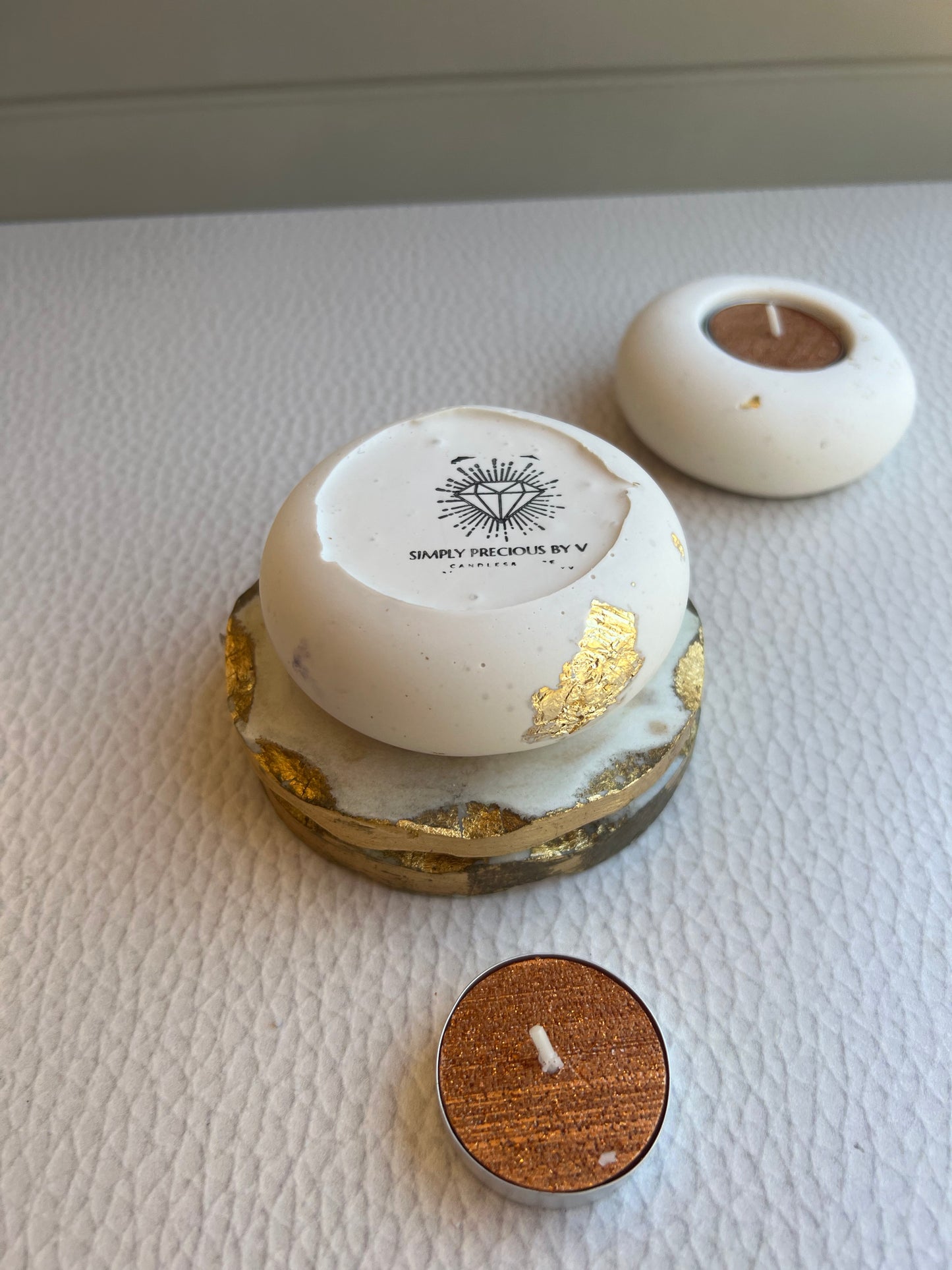 Handmade tealight candle holder made with jesmonite and gold leaf