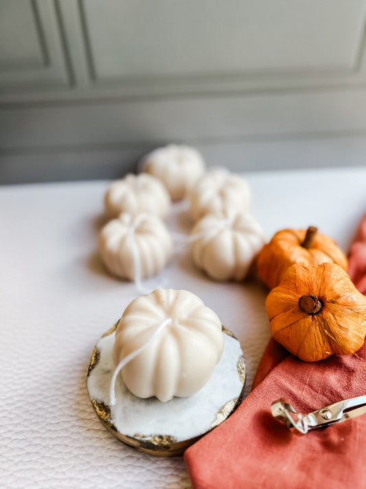 Small cute little pumpkin candle